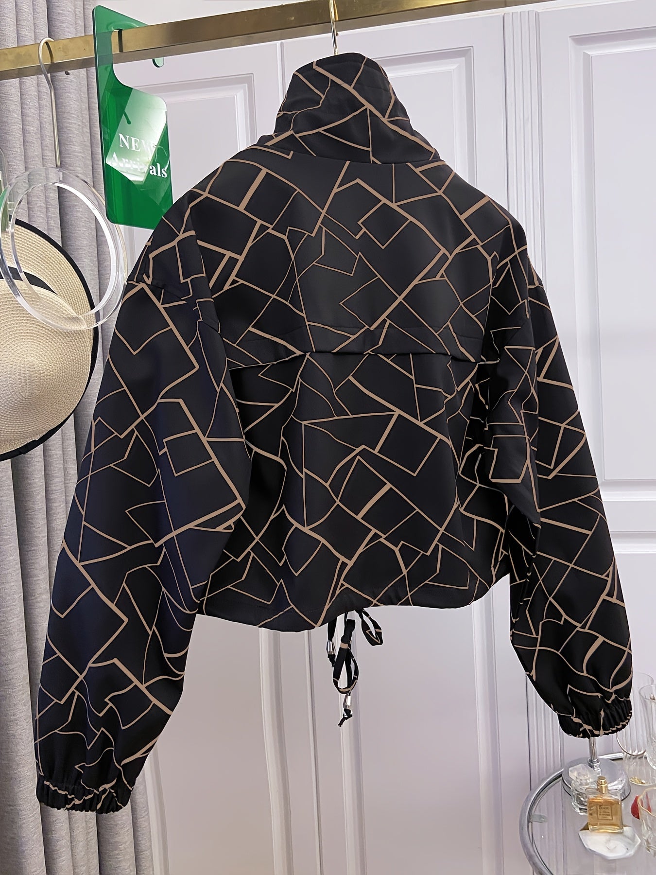 Women’s short jacket with stand-up collar and patterned print