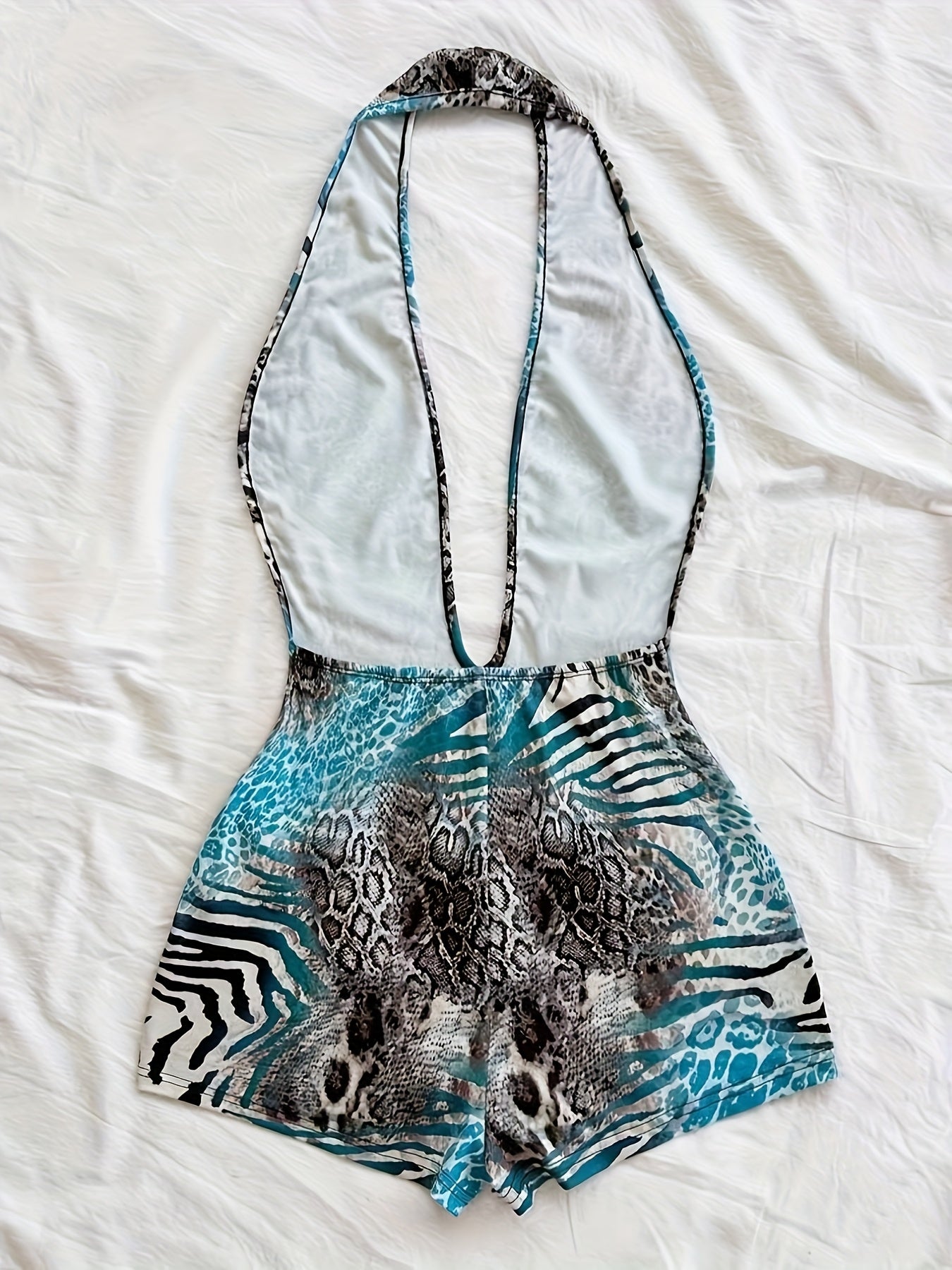 Women's jumpsuit with animal print and deep neckline – fashionable one-piece for summer, beach & party