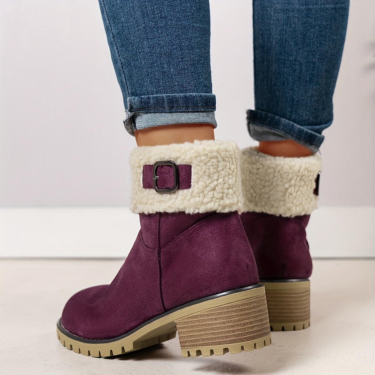 Women’s short winter boots with warm lining, buckle, and heel