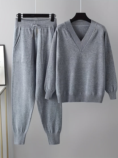 Two-piece women’s knitted set with a V-neck sweater and jogger pants in a beige ribbed-knit design