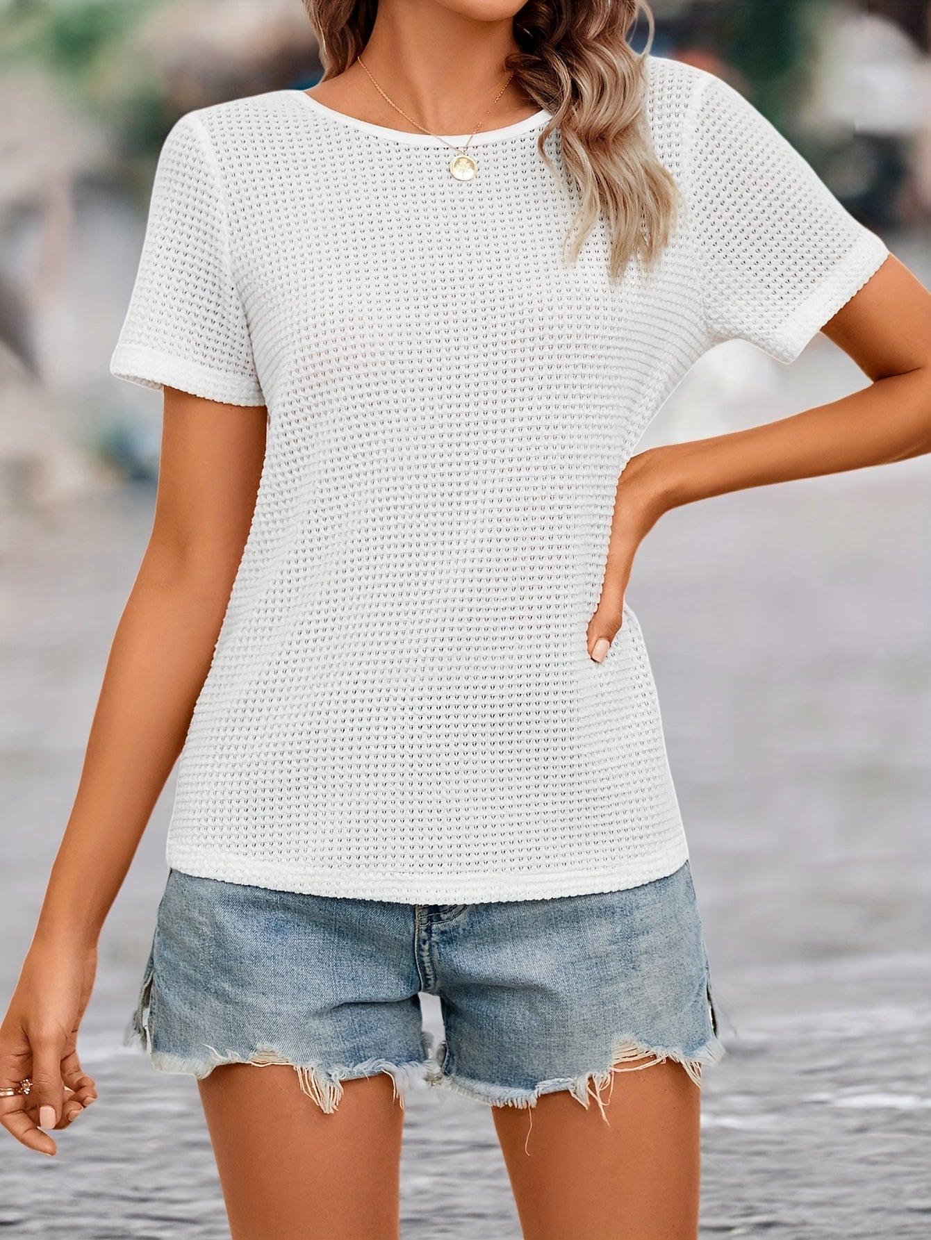 Women's short-sleeve top with lace back cutout and bow – feminine style for casual wear and summer