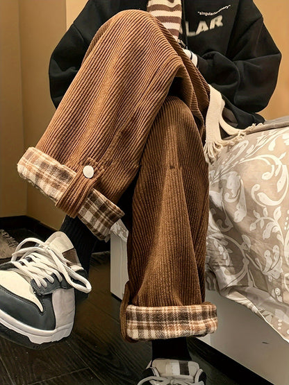 Corduroy trousers with a checked cuff – Wide fit, unisex