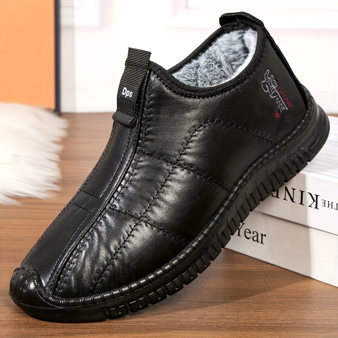 Men's lined black quilted winter slip-on shoes
