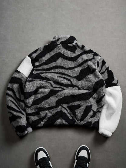 Unisex fleece jacket with stand-up collar, zipper, and animal print