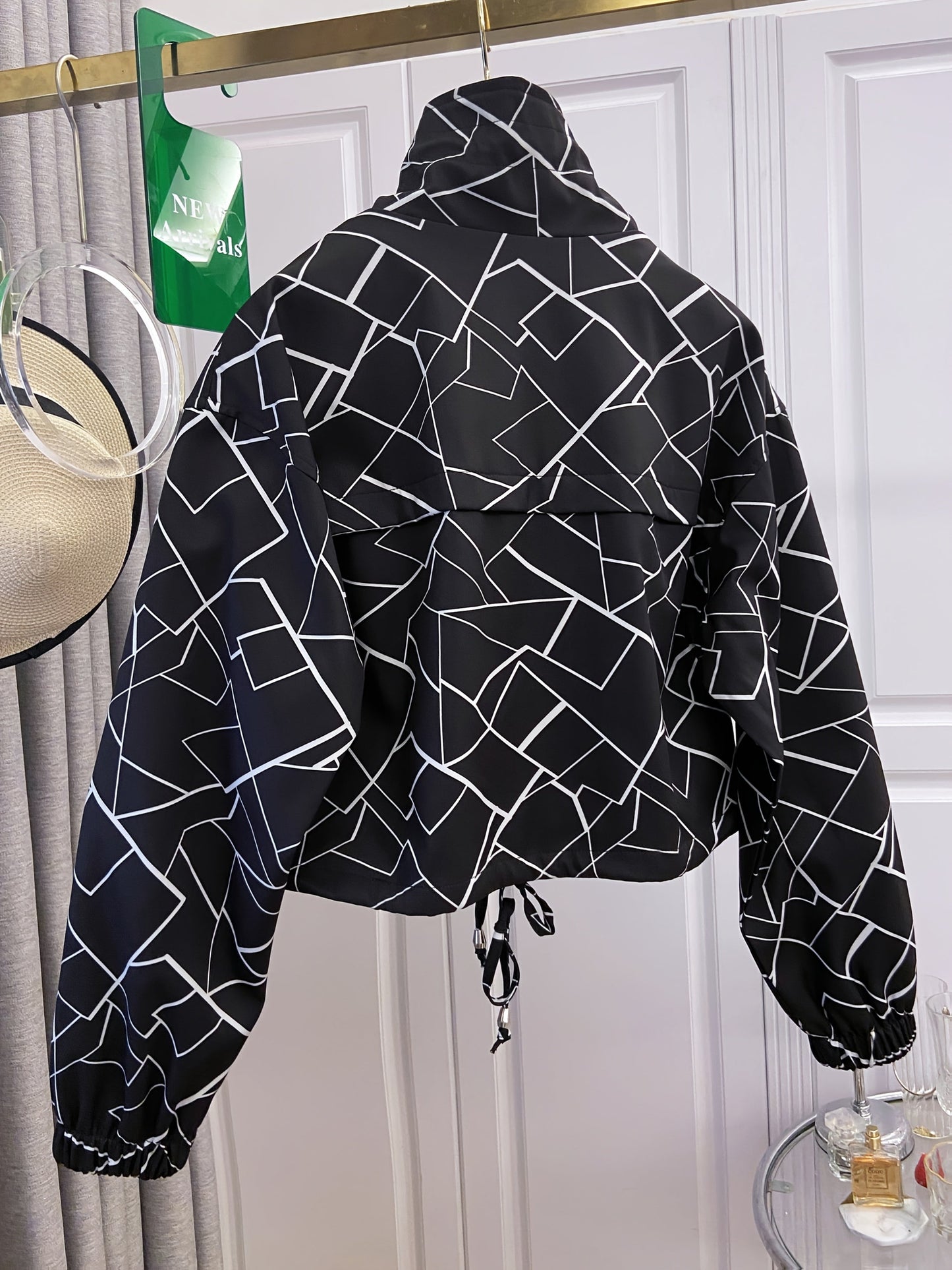 Women’s short jacket with stand-up collar and patterned print