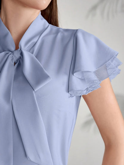 Women's blouse with bow and ruffle sleeves – Elegant office and casual style