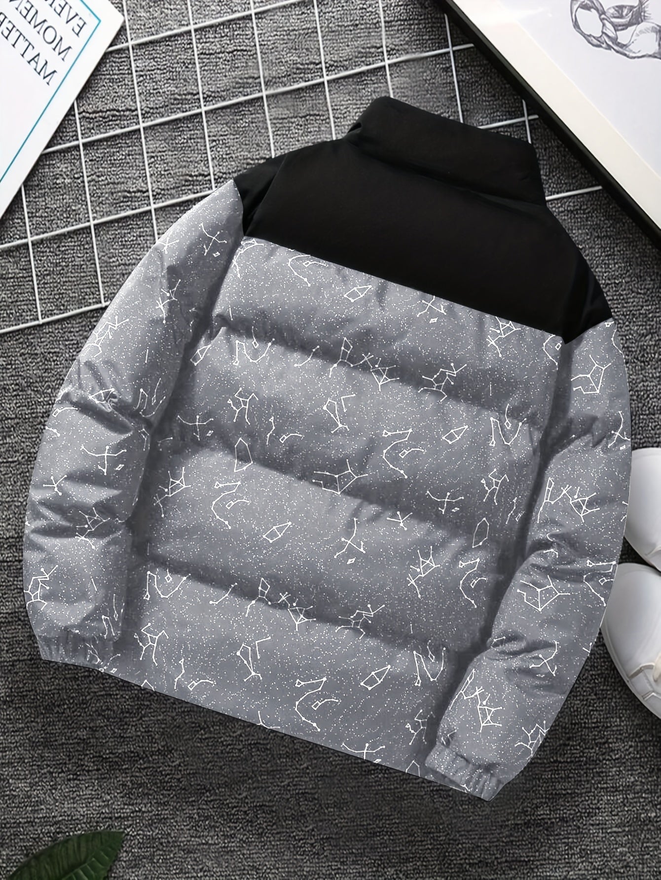Padded jacket with constellation print, zipper, and stand-up collar