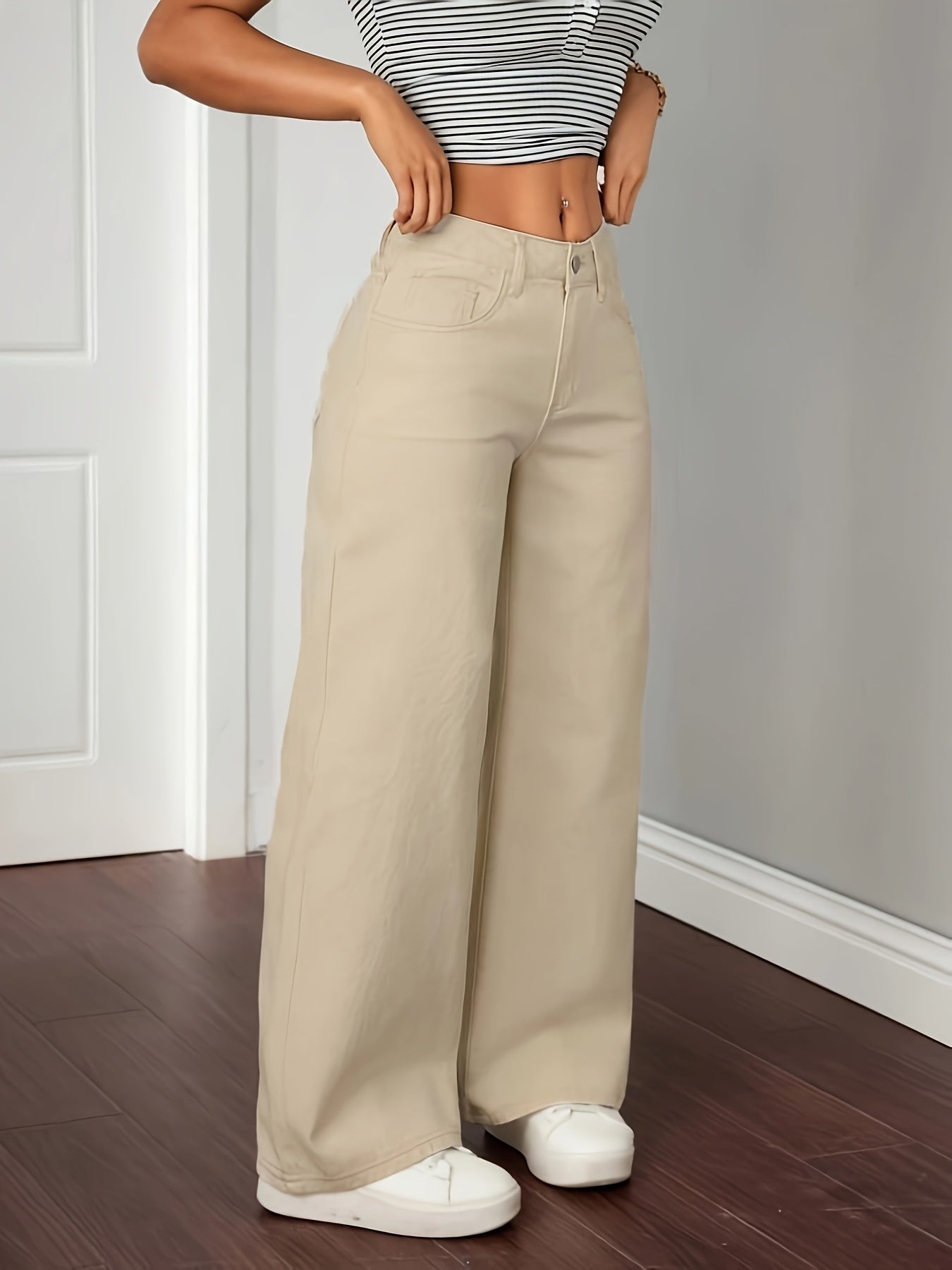 Women's wide-leg beige trousers with a straight leg and high waist