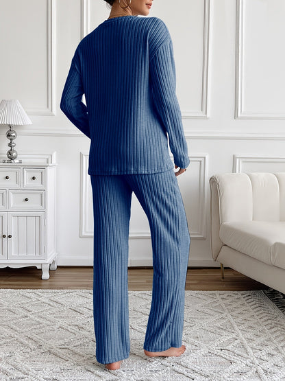 Ribbed women’s two-piece set with a V-neck top featuring lettering and wide-leg pants
