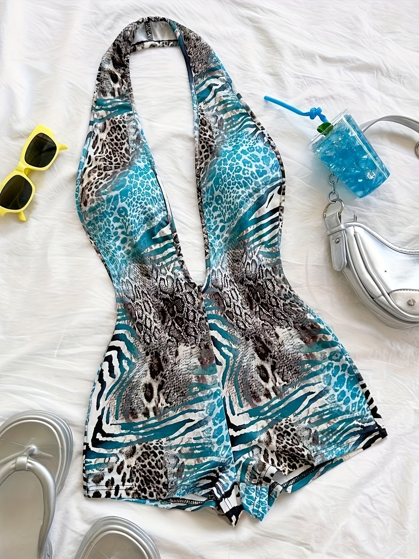 Women's jumpsuit with animal print and deep neckline – fashionable one-piece for summer, beach & party