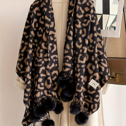 Leopard-print scarf with pom-poms