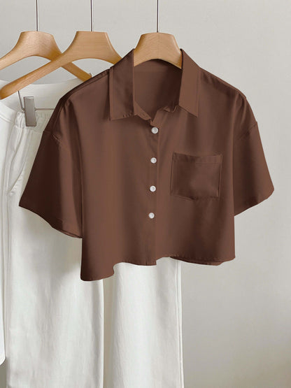 Women's short-sleeve blouse with crop cut and chest pocket – modern casual shirt