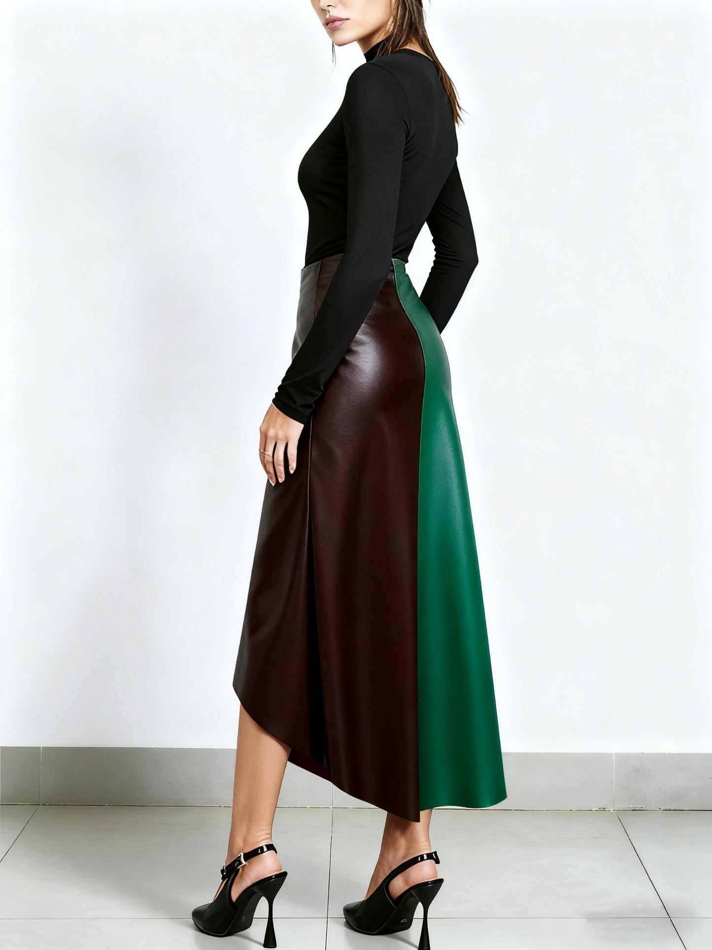 Color-block midi skirt with an asymmetrical faux-leather hem