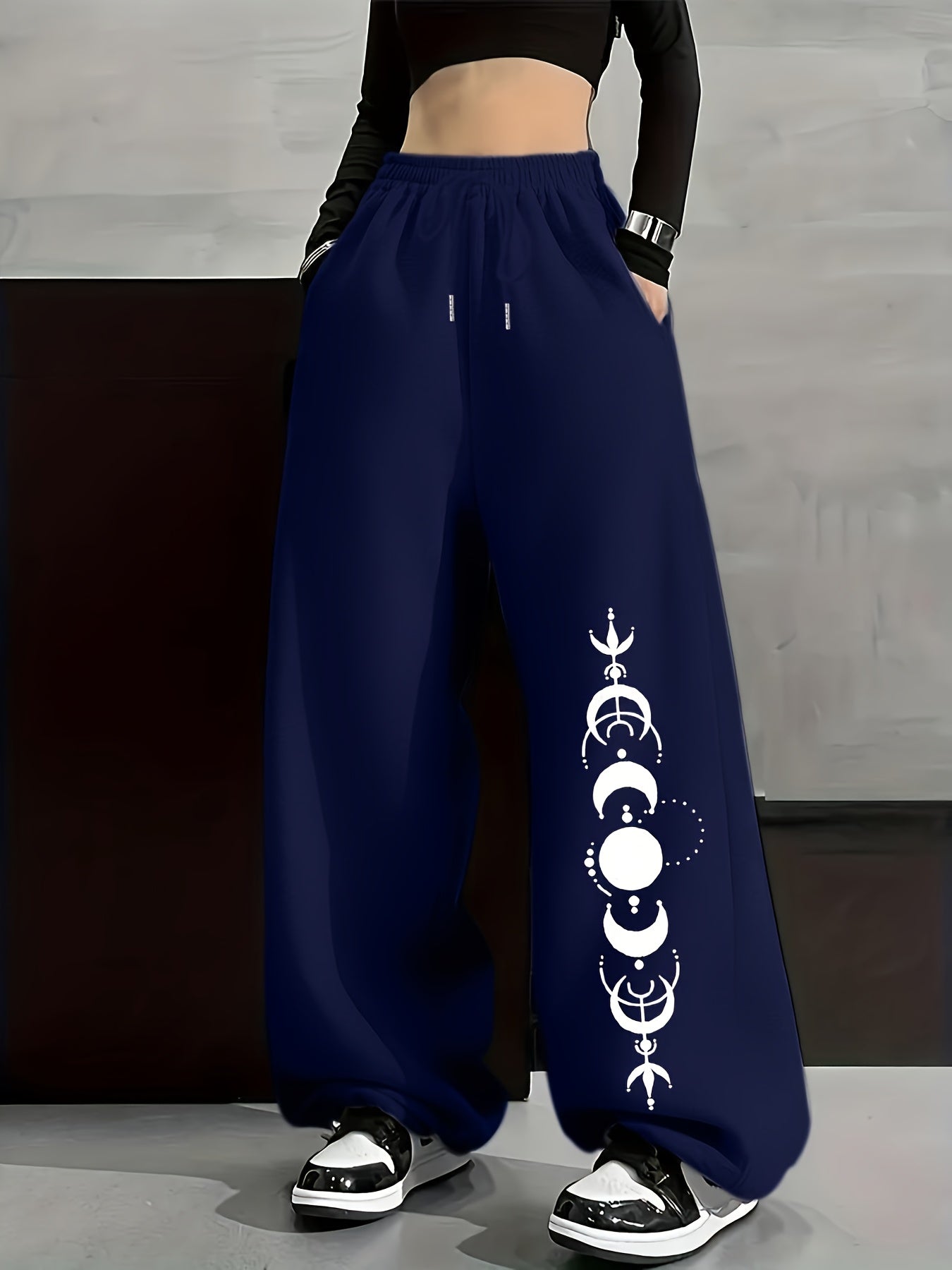 Wide-leg lounge pants with moon phase pattern, elastic waistband