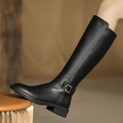 Women's knee-high black boots with buckle