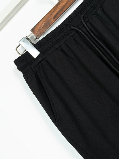 Men's two-piece set: quilted crew-neck pullover & jogging pants in white and black