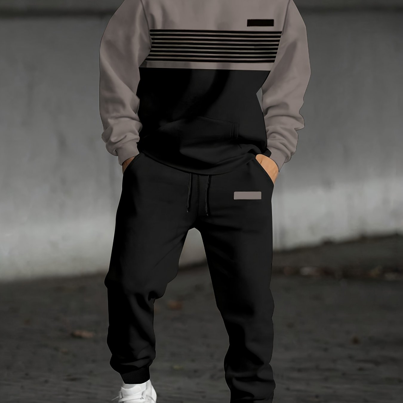 Men's two-piece tracksuit with hoodie and pants, striped color-block design