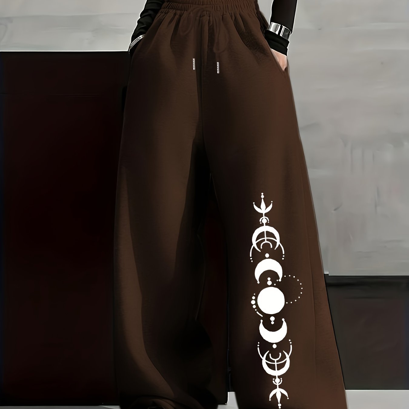 Wide-leg lounge pants with moon phase pattern, elastic waistband