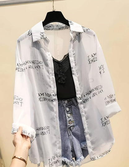 Women's blouse with newspaper print and shorts – fashionable set for leisure and everyday wear