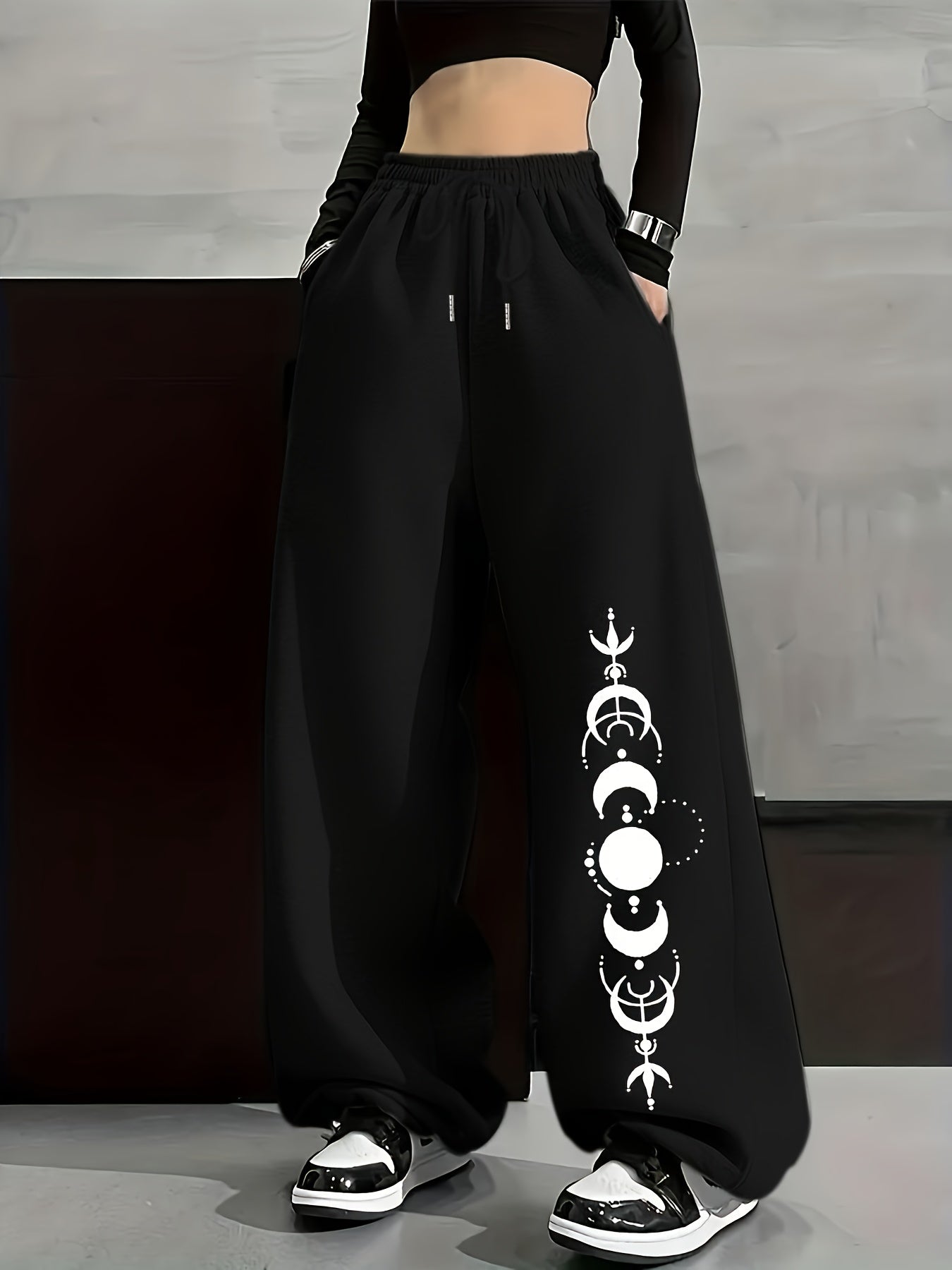 Wide-leg lounge pants with moon phase pattern, elastic waistband