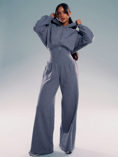 Women's jumpsuit with hood, long sleeves, wide legs, and zipper