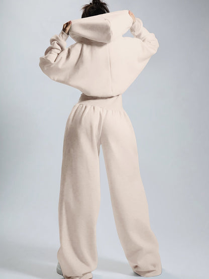 Women's jumpsuit with hood, long sleeves, wide legs, and zipper