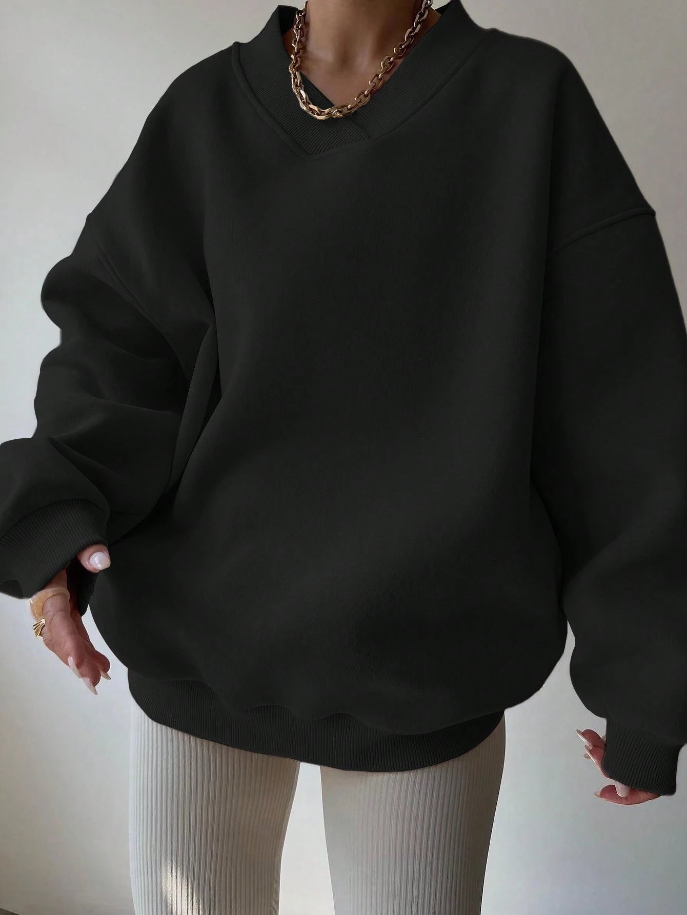 Black oversized V-neck sweatshirt for women