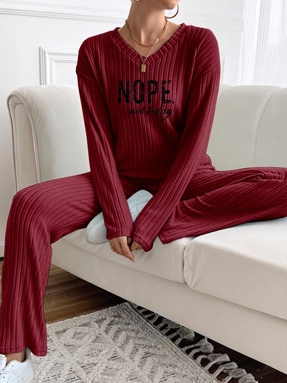 Ribbed women’s two-piece set with a V-neck top featuring lettering and wide-leg pants