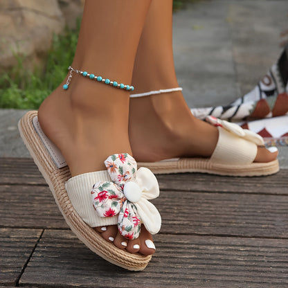 Women's summer slides with large floral bow – fashionable espadrille-style slides for leisure & vacation
