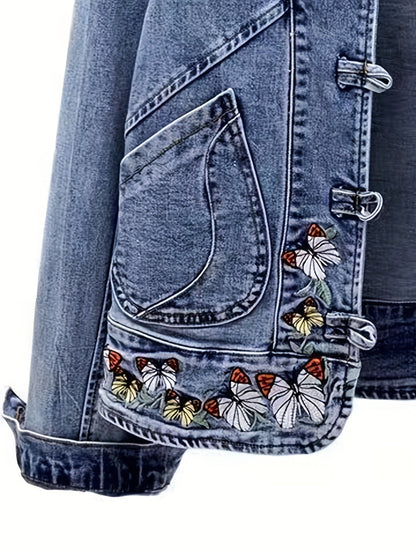 Women's denim jacket with stand-up collar, frog closures, and embroidery