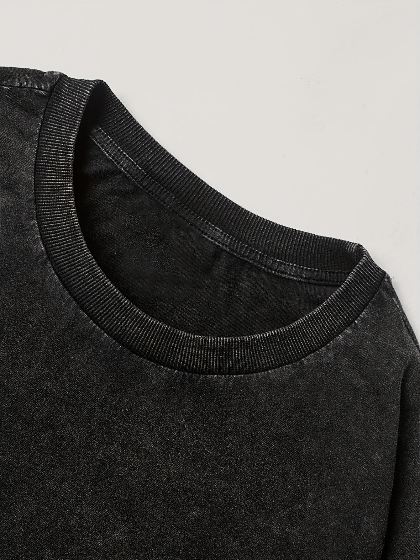 Unisex long-sleeve shirt, black cotton-look fabric, crew neck, “NO RISK NO STORY” print with sleeve patches