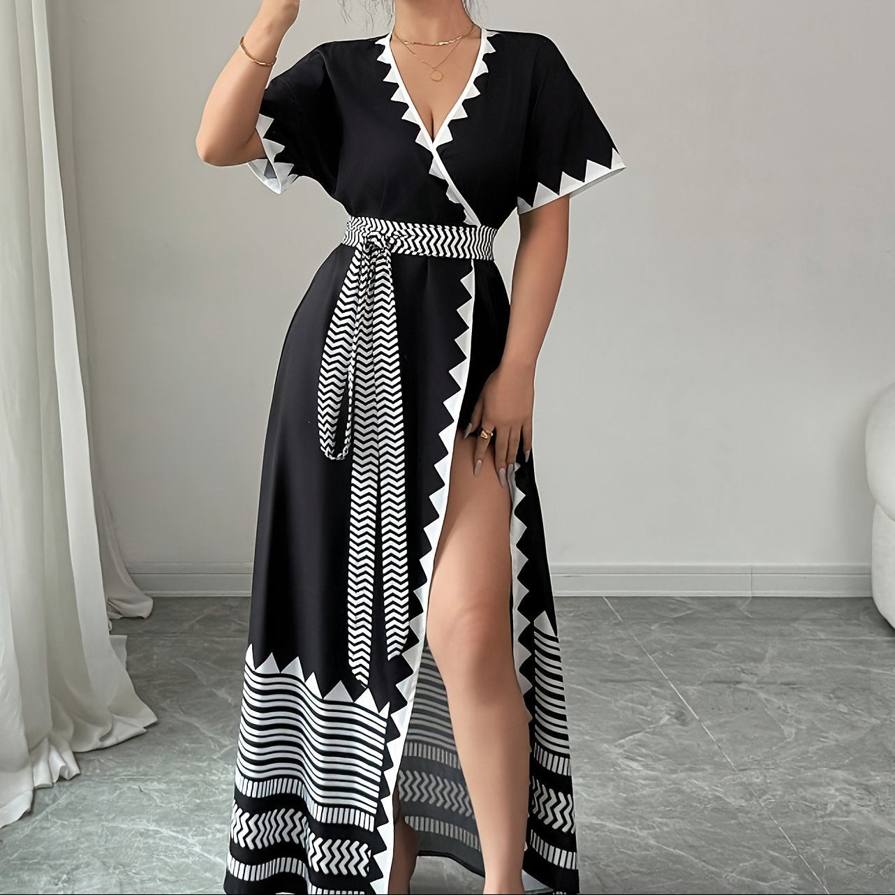 Women's maxi dress with graphic pattern and waist belt – Elegant summer dress for festive occasions