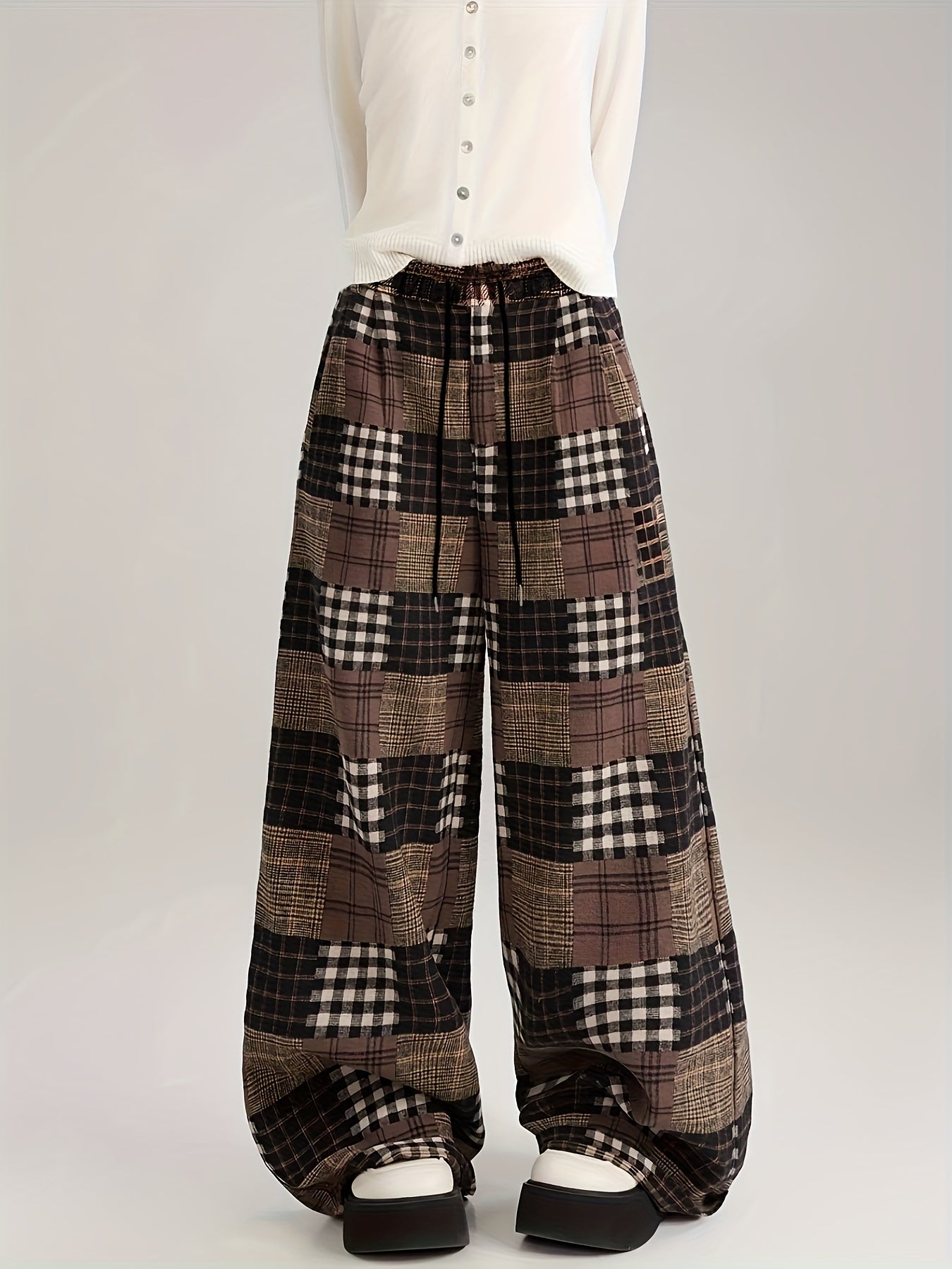 Weite Patchwork-Hose mit Karomuster und Innenfutter