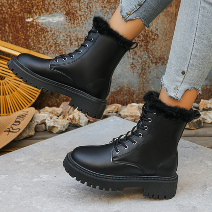 Women's worker boots with faux-fur lining, lacing, and lug soles