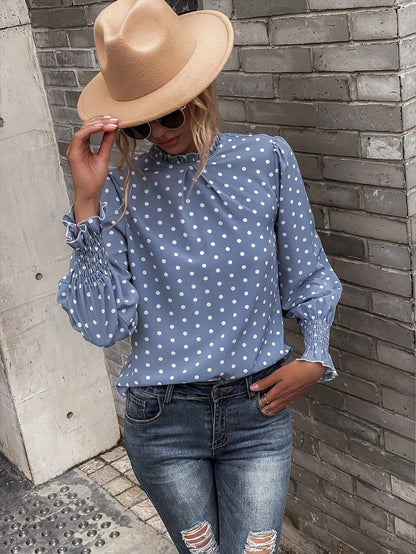 Women's blouse with polka-dot pattern, stand-up collar, and gathered sleeves