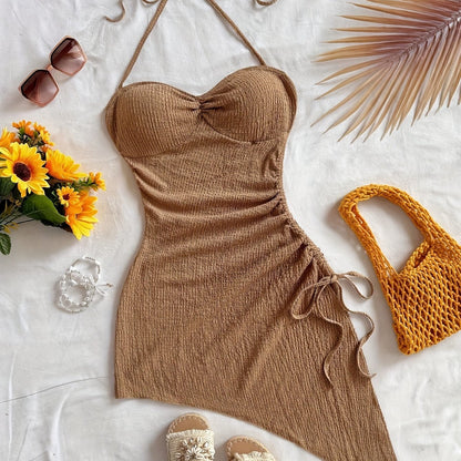 Women's bodycon dress with asymmetrical hem and halter neck – Elegant summer look for party & vacation