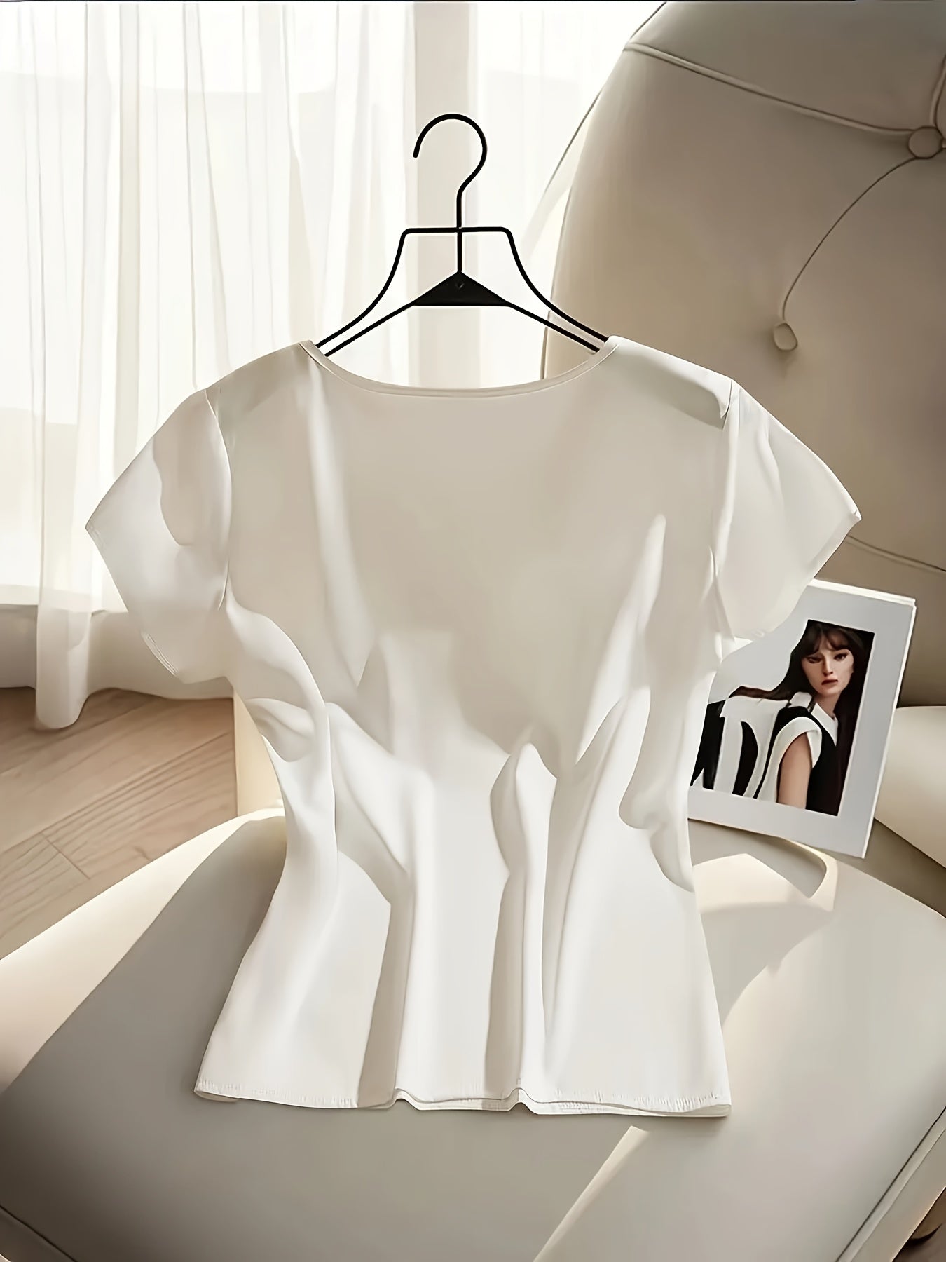 Women's blouse with bow and short sleeves – elegant style for office and special occasions