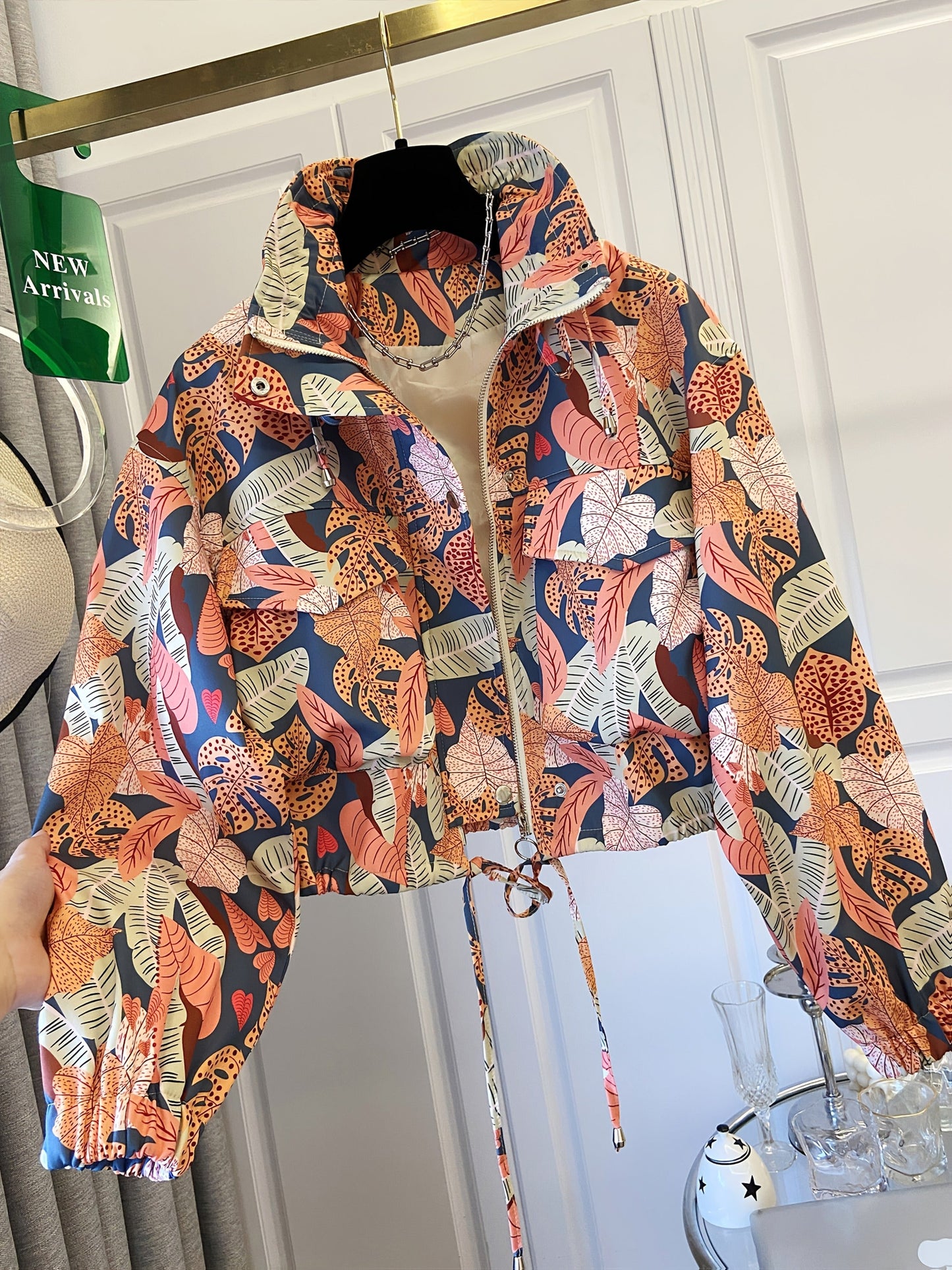 Women’s short jacket with stand-up collar and patterned print
