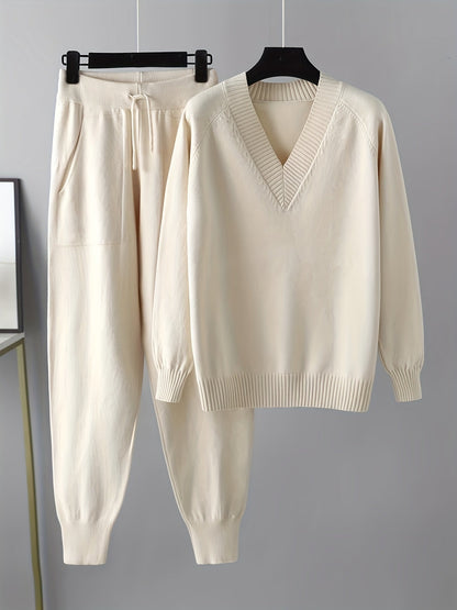 Two-piece women’s knitted set with a V-neck sweater and jogger pants in a beige ribbed-knit design