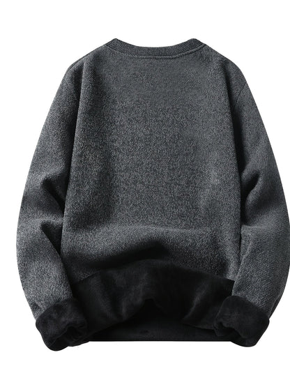 Unisex long-sleeve pullover with a crew neck and ribbed cuffs, lined