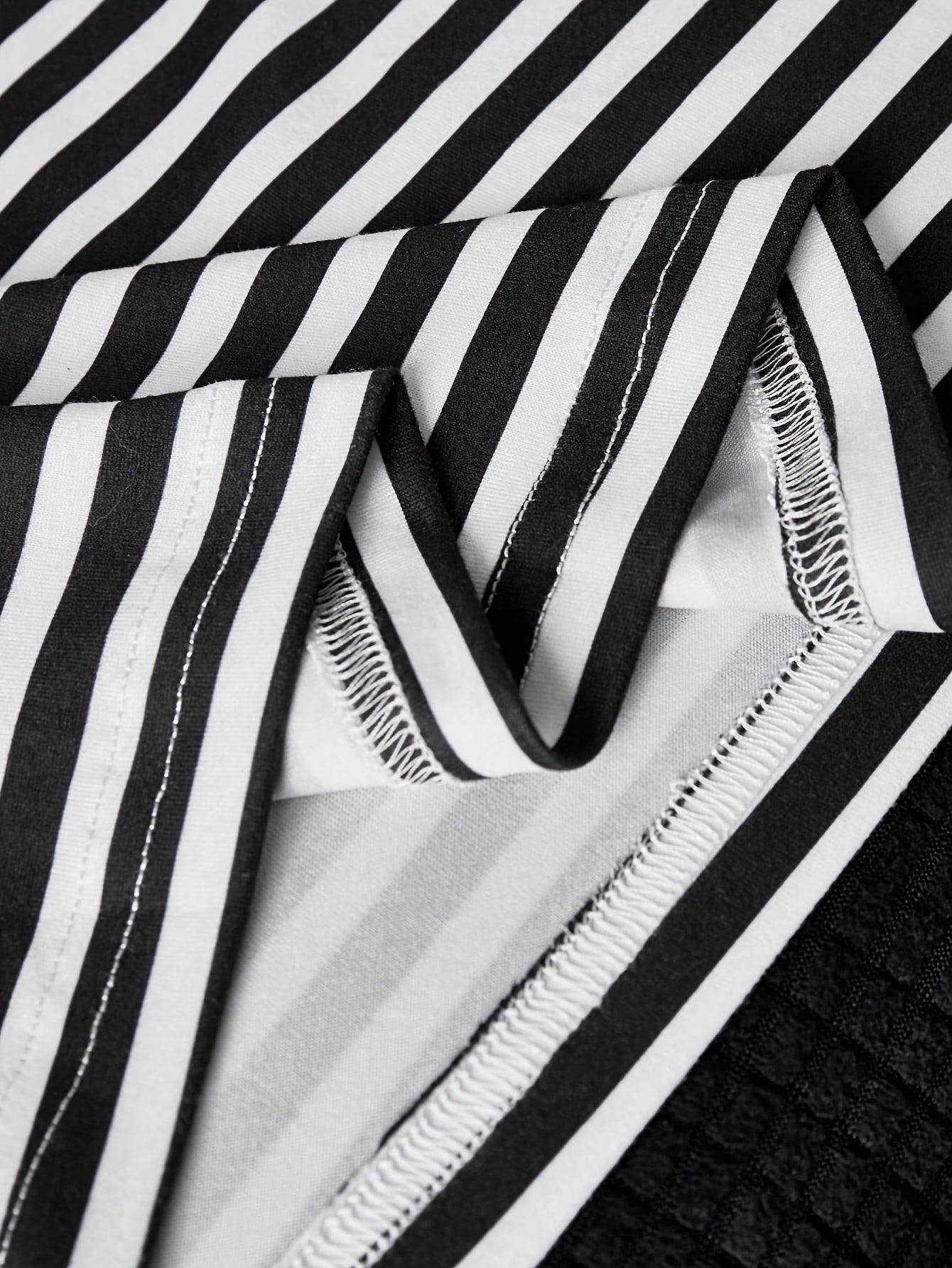 Women's polo shirt with stripes and V-neck – smart-casual style for leisure and office
