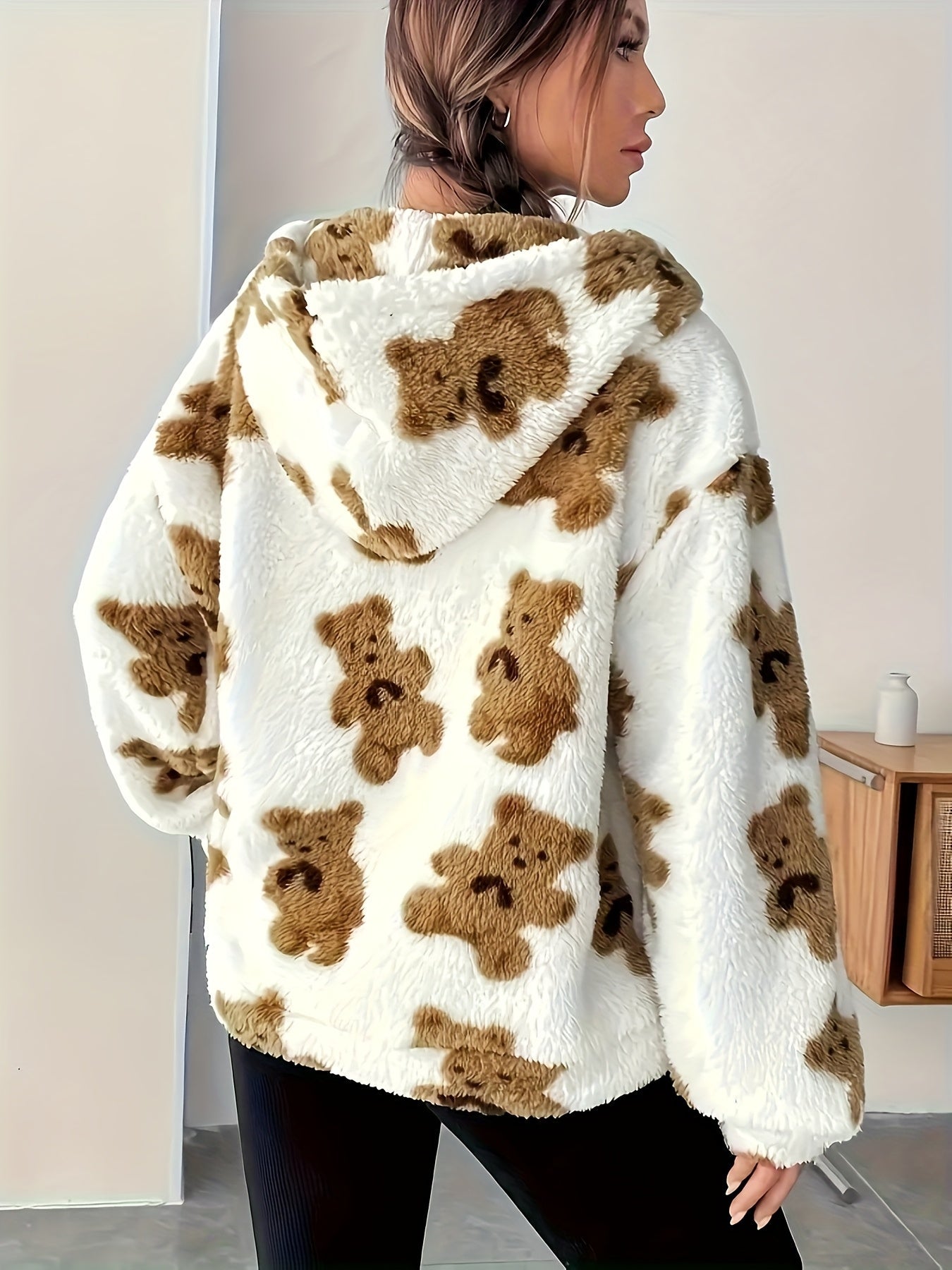 White fluffy hoodie with a brown teddy bear pattern for women