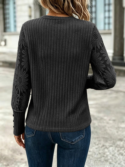 Women's rib-knit sweater with lace sleeves and a crew neck