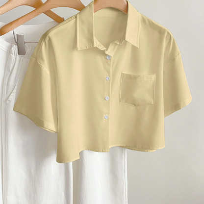 Women's short-sleeve blouse with crop cut and chest pocket – modern casual shirt