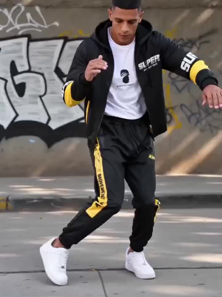 Men's sports tracksuit with a zip-up hooded jacket and striped joggers