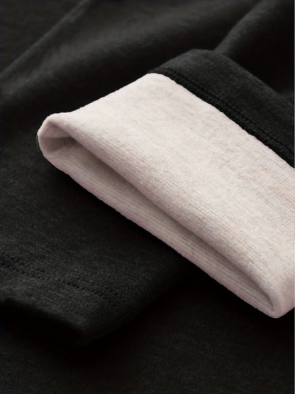 Women's black high-waisted leggings with a thermal look, opaque
