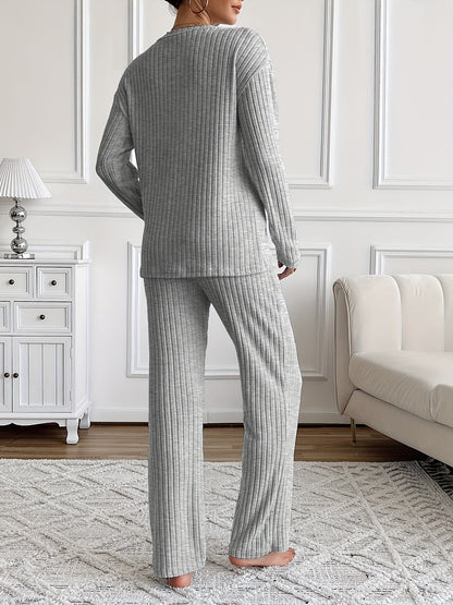 Ribbed women’s two-piece set with a V-neck top featuring lettering and wide-leg pants