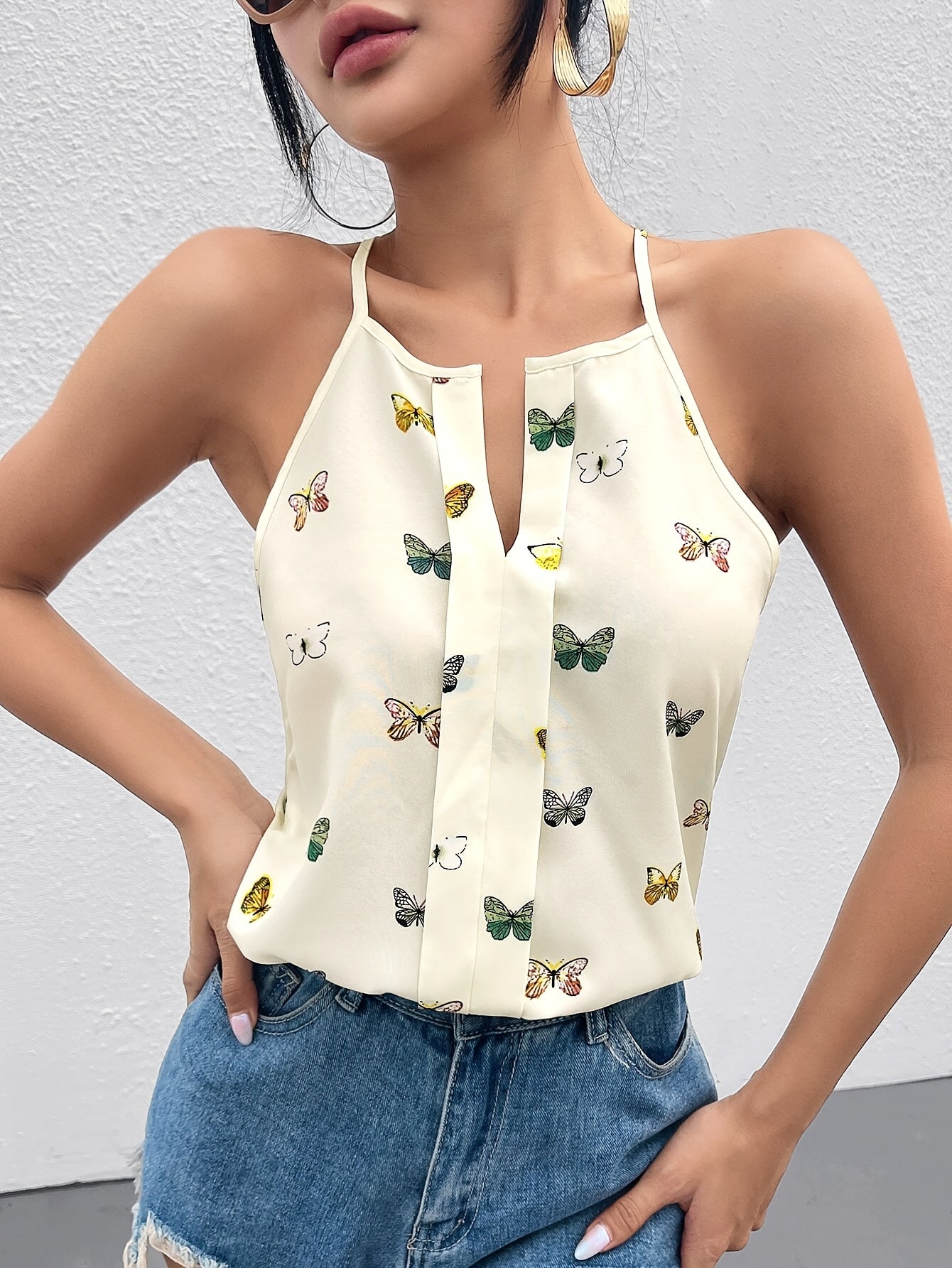 Women's top with butterfly print and spaghetti straps – Elegant summer blouse for leisure and everyday wear
