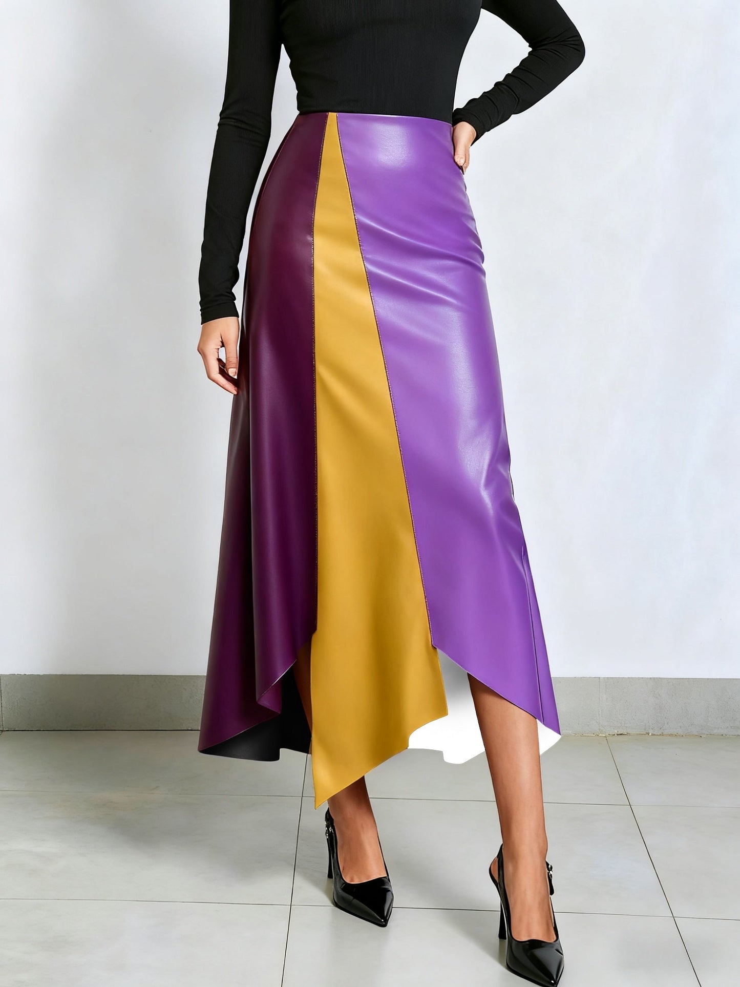 Color-block midi skirt with an asymmetrical faux-leather hem