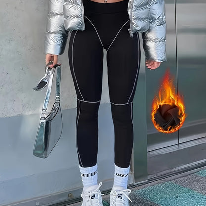 Black leggings with contrasting stitching, high waist
